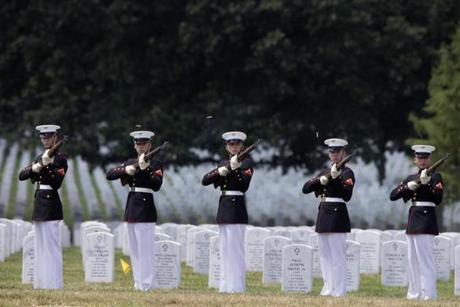 Marines fired three rifle volleys during a burial service at Arlington National Cemetery in August.
