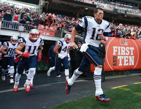Tom Brady, who led his team out onto the field for Sunday?s game, was eager to return.
