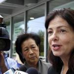 Republican U.S. Sen. Kelly Ayotte talks to reporters Tuesday Oct. 4, 2016 in Hudson, N.H. telling them she â??misspokeâ?? when she said Donald Trump is a role model for children during a live televised debate Monday evening. (AP Photo/Jim Cole)