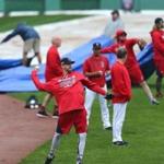 Red Sox pitchers warmed up on Sunday, but had to wait until Monday.