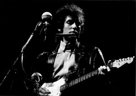 Bob Dylan performing at the Newport Folk Festival in 1965. 
