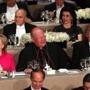 Cardinal Timothy Dolan sat between Hillary Clinton and Donald Trump at the Waldorf Astoria in New York.