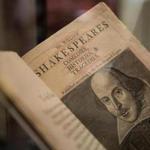 A surviving copy of Shakespeare's First Folio sits in a display glass case at Sotheby's in Hong Kong, China, on Monday.