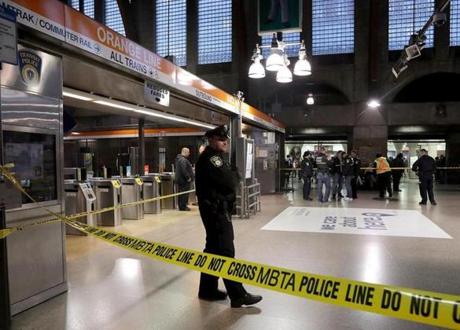 Boston, MA: 10-26-2016: Transit police block access to the Orange Line platform after an apparent fire on one of the Orange Line trains at Back Bay Station in Boston, Mass. October 26, 2016. Photo/John Blanding, Boston Globe staff story/Travis Andersen, Metro ( 27mbtadelay )

