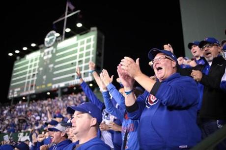 Fans at Wrigley Field cheered Friday during the first World Series game at the ballpark in 71 years.
