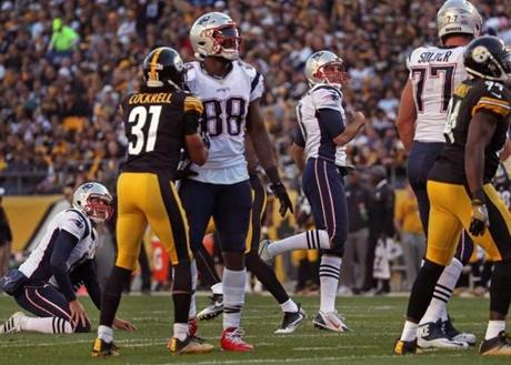 Pittsburgh, PA - 10-23-16 - New England Patriots kicker Stephen Gostkowski (3) watches his extra point kick sail through the uprights on the Patriots first touchdown of the game in the first quarter. Gostkowski would miss an extra point kick later in the game. Heinz Field - New England Patriots at Pittsburgh Steelers - 1st quarter action. (Barry Chin/Globe staff)
