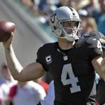 Oakland Raiders quarterback Derek Carr (4) throws a pass against the Jacksonville Jaguars during the first quarter of an NFL football game Sunday, Oct. 23, 2016, in Jacksonville, Fla. (AP Photo/Chris O'Meara)