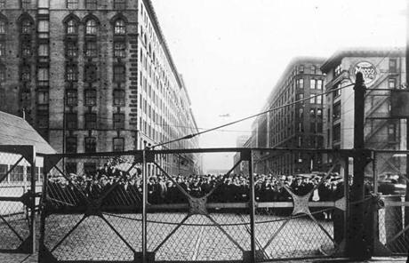 A crowd gathered on the South Boston side of the bridge the day after the incident.
