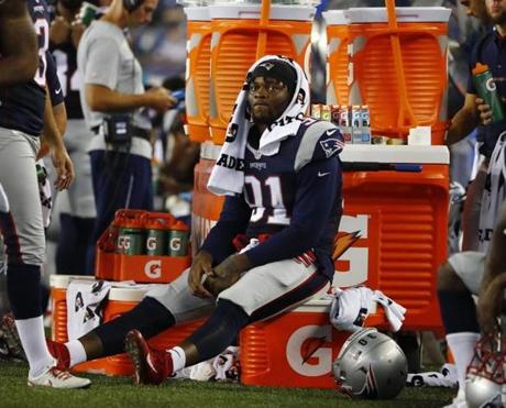 New England Patriots outside linebacker Jamie Collins sits on a Gatorade cooler runs against the New Orleans Saints during the second half of a preseason NFL football game Thursday, Aug. 11, 2016, in Foxborough, Mass. (AP Photo/Winslow Townson)
