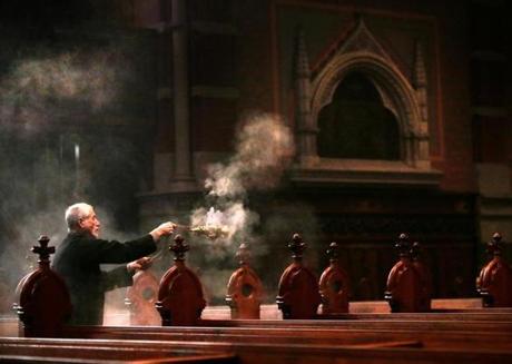 Boston, MA - 10/27/16 - Thurifer Louis Verdelotti (cq) swings a censer as Beneficia lucis (cq) chants in the sanctuary at Old South Church. A conference at Old South Church contemplates how we can rediscover sacred time and reconstruct a day of rest. Lane Turner/Globe Staff Section: METRO Reporter: Lisa Wangsness Slug: 30sabbath
