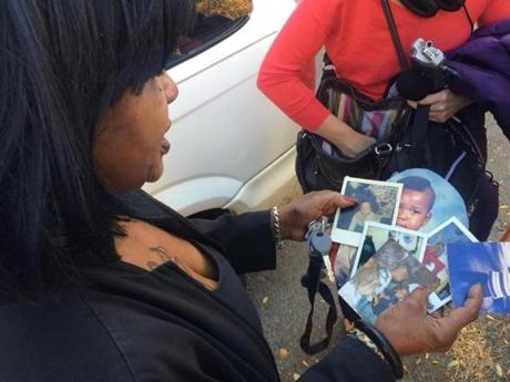  Hope Coleman held photos of her son Terrence Coleman, who was shot and killed by Boston police on Sunday.
