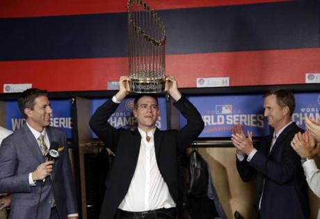 Nov 2, 2016; Cleveland, OH, USA; Chicago Cubs president Theo Epstein holds the commissioner's trophy after game seven of the 2016 World Series against the Cleveland Indians at Progressive Field. Mandatory Credit: David J. Phillip/Pool Photo via USA TODAY Sports
