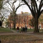 A man walks through Harvard Yard at Harvard University. 
