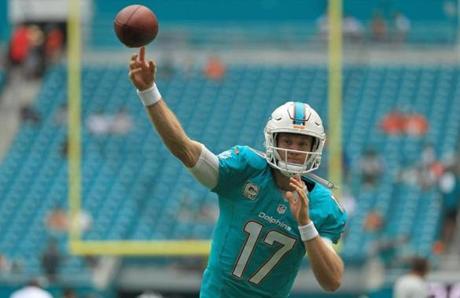 MIAMI GARDENS, FL - NOVEMBER 06: Ryan Tannehill #17 of the Miami Dolphins warms up during a game against the New York Jets at Hard Rock Stadium on November 6, 2016 in Miami Gardens, Florida. (Photo by Mike Ehrmann/Getty Images)

