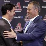 New Arizona Diamondbacks manger Torey Lovullo, right, is greeted by Diamondbacks' Executive Vice President and General Manager Mike Hazenor for the first time as manager, Monday, Nov. 7, 2016, at Chase Field n Phoenix. (AP Photo/Matt York)