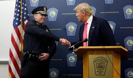 Donald Trump shook hands with Manchester Police Chief Nick Willard earlier this year.
