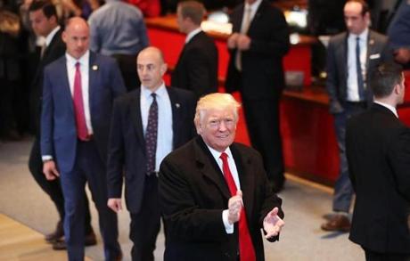 President-elect Donald Trump walked through the lobby of The New York Times following a meeting with editors on Tuesday.
