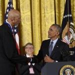 President Barack Obama shook hands with NBA star Kareem Abdul-Jabbar shortly before presenting him with the Presidential Medal of Freedom.