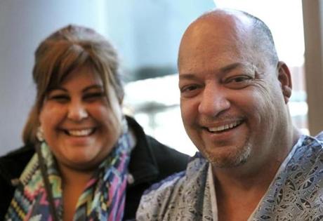 Isaac Cosme and his wife, Monica, at Massachusetts General Hospital.
