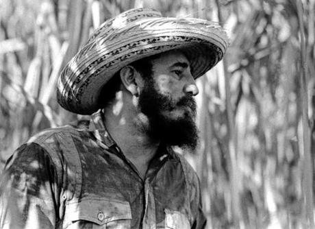 FILE - In this April 14, 1966 file photo, Cuba's leader Fidel Castro stands on a sugar cane plantation in Cuba. Former President Fidel Castro, who led a rebel army to improbable victory in Cuba, embraced Soviet-style communism and defied the power of 10 U.S. presidents during his half century rule, has died at age 90. The bearded revolutionary, who survived a crippling U.S. trade embargo as well as dozens, possibly hundreds, of assassination plots, died eight years after ill health forced him to formally hand power over to his younger brother Raul, who announced his death late Friday, Nov. 25, 2016, on state television. (Roberto Salas/Prensa Latina via AP Images, File)
