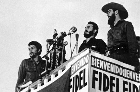 (FILES) This handout picture by the Consejo de Estado and taken on January 8, 1959 of Cuban leader Fidel Castro (C) delivering a speech next to Camilo Cienfuegos (R) and Ernesto Che Guevara (L) in Havana. Cuban revolutionary icon Fidel Castro died late on November 25, 2016 in Havana, his brother, President Raul Castro, announced on national television. / AFP PHOTO / Consejo de Estado / HOHO/AFP/Getty Images
