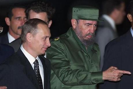 (FILES) This file photo taken on December 13, 2000 shows Cuban President Fidel Castro welcoming Russian President Vladimir Putin at Jose Marti Airport in Havana. P Cuban revolutionary icon Fidel Castro died late on November 25, 2016 in Havana, his brother, President Raul Castro, announced on national television. / AFP PHOTO / SERGEI CHIRIKOVSERGEI CHIRIKOV/AFP/Getty Images
