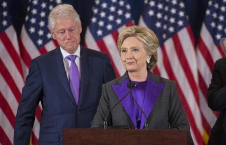 FILE -- Hillary Clinton, accompanied by Bill Clinton, gives a concession speech before campaign staff and supporters at the New Yorker hotel in Manhattan, Nov. 9, 2016. The decision by Donald Trump on whether to further investigate Hillary Clinton will signal if he intends to look ahead and â??bind the wounds of division,â?? as he pledged to do in his acceptance speech, or look back and settle political scores. (Ruth Fremson/The New York Times)
