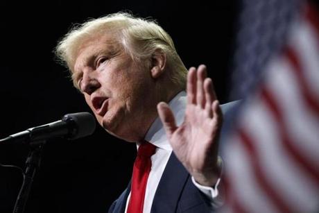 FILE - In this Nov. 4, 2016, file photo, Donald Trump speaks in Hershey, Pa. President-elect Trump holds stock in the company building the disputed Dakota Access oil pipeline, and pipeline opponents warn that Trumpâ??s investments could undercut any decision he makes on the $3.8 billion project as president. (AP Photo/ Evan Vucci, File)

