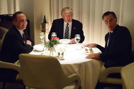 President-elect Donald Trump ate dinner with Mitt Romney (right) and Reince Priebus (left) at Jean Georges restaurant on Tuesday.
