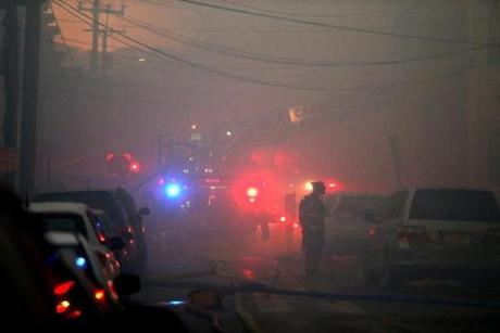 Firefighters responded to a10-alarm fire in East Cambridge on Saturday.
