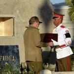 President Raul Castro of Cuba received his older brother?s ashes from an honor guard in Santiago, Cuba, on Sunday.