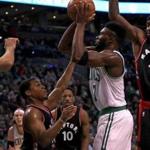 Boston, MA - 12/09/2016 - (2nd quarter) Boston Celtics forward Jaylen Brown (7) finds his lane blocked by a host of Toronto Raptors. as he pulls up for a shot during the second quarter. Celtics vs. Raptors at TD Garden. - (Barry Chin/Globe Staff), Section: Sports, Reporter: Adam Himmelsbach, Topic: 10Celtics-Raptors, LOID: 8.3.931477054.