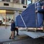 BOSTON, MA - 12/14/2016:NEW BUILDING.....a look at the new site....MOVING DAY... movers with wrapped pianos placed them into trucks from M. Steinert and Sons and delivered them to the new home at the Park Plaza building. The Murphy family, which runs the business, will re-open to the public at the Park Plaza building on Dec. 16. It will be120 years to the day from when they moved into the M. Steinert and Sons building on Boylston Street.. (David L Ryan/Globe Staff Photo) SECTION: BUSINESS TOPIC 15steinert