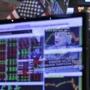 Federal Reserve Chair Janet Yellen's news conference in Washington was reflected on a specialist's screen on the floor of the New York Stock Exchange.