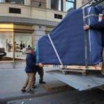 BOSTON, MA - 12/14/2016:NEW BUILDING.....a look at the new site....MOVING DAY... movers with wrapped pianos placed them into trucks from M. Steinert and Sons and delivered them to the new home at the Park Plaza building. The Murphy family, which runs the business, will re-open to the public at the Park Plaza building on Dec. 16. It will be120 years to the day from when they moved into the M. Steinert and Sons building on Boylston Street.. (David L Ryan/Globe Staff Photo) SECTION: BUSINESS TOPIC 15steinert