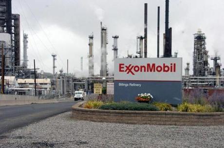 FILE - This Wednesday, Sept. 21, 2016, file photo shows Exxon Mobil's Billings Refinery in Billings, Mont. President-elect Donald Trump this week tapped ExxonMobil CEO Rex Tillerson to serve as his secretary of state. If confirmed by the Senate, where opposition is emerging, the move could have broad consequences for U.S. environmental policy and affect the role the U.S. plays in multinational discussions about climate change. (AP Photo/Matthew Brown, File)
