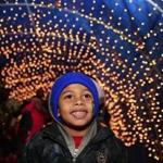 Anthony Sanchez, 4, was all smiles as he left Christmas in the City through the Christmas Tunnel. 