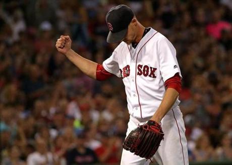 Boston, MA - 8/13/2016 - (3rd inning) Boston Red Sox starting pitcher Clay Buchholz (11) pumps his fist after getting a double play for the last outs in the top of the third inning. The Boston Red Sox take on the Arizona Diamondbacks in Game 2 of a 3 game series at Fenway Park. - (Barry Chin/Globe Staff), Section: Sports, Reporter: Peter Abraham, Topic: 14Red Sox-Diamondbacks, LOID: 8.2.3934427785.
