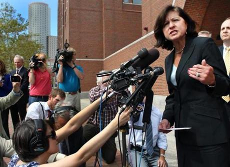 US Attorney Carmen Ortiz spoke to reporters about the sentencing of Sal DiMasi in 2011.
