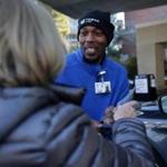 Concord Ma- 12/21//2016 Towne Park Valet employees who work at Emerson Hospital ,sometime sing to patients who are checking into hospital. Shayne Bowen (cq) at valet check in. Jonathan Wiggs /GlobeStaff) Reporter:Topic