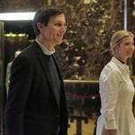 Jared Kushner and his wife Ivanka Trump walk through the lobby of Trump Tower in New York, Friday, Nov. 18, 2016. (AP Photo/Richard Drew)