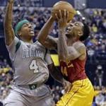 Indiana Pacers guard Jeff Teague (44) prepares to shoot against Boston Celtics guard Isaiah Thomas (4) during the first half of an NBA basketball game in Indianapolis, Thursday, Dec. 22, 2016. The Celtics won 109-102. (AP Photo/Michael Conroy)