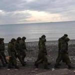 Soldiers patrolled the shores of the Black Sea at Sochi on Monday, the day after a Russian jet crashed after takeoff. 