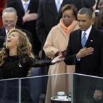 FILE - This Jan. 21, 2013 file photo shows President Barack Obama, right, as Beyonce sings the National Anthem at the ceremonial swearing-in at the U.S. Capitol during the 57th Presidential Inauguration in Washington. On Wednesday, President-elect Donald Trump picked 