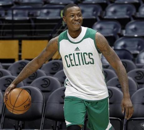 Atlanta, GA - 4/18/2016 - Boston Celtics Terry Rozier jokes with a teammate during practice at Philips Arena as they prepare for their second playoff game against the Hawks in Atlanta, Georgia April 18, 2016. Jessica Rinaldi/Globe Staff Topic: Reporter: 

