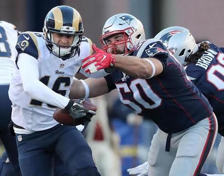 Foxborough, MA - 12-4-16 - New England Patriots Rob Ninkovich sacking Los Angeles Rams Jared Goff for a 7 yard loss during third quarter action at Gillette Stadium. (Matthew J. Lee/Globe staff)
