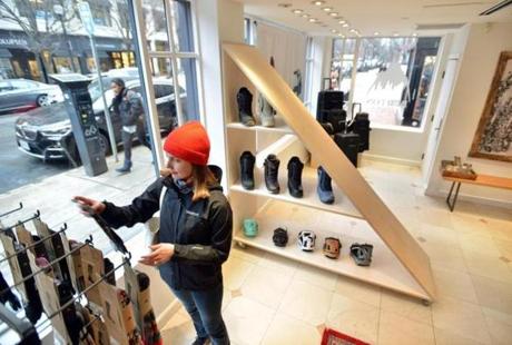 Maretta Silverman of Boston looks through the racks in the recently opened Burton pop up retail shop on Newbury Street as a trial by the snowboard retailer. Pop ups are one a bright spot in an otherwise bleak retail climate in Boston. Josh Reynolds for The Boston Globe (Business, woolhouse) 
