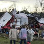 Residents examined the wreckage of a barn near Mount Olive, Miss., Monday. Officials blamed a tornado.
