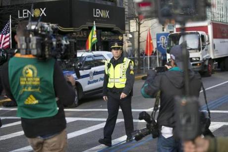 FILE -- Mark Wahlberg during the filming of ÒPatriots Day,Ó the movie that revisits the 2013 Boston Marathon bombing, in Boston, April 18, 2016. With ÒPatriots Day,Ó set for release in the coming months, the worry is that some people Ñ New Englanders in particular Ñ will view the film as a callous effort to translate tragedy into entertainment. (Katherine Taylor/The New York Times)
