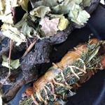 Napa grapevines serve as kindling for smoked duck at The Blue Ox.